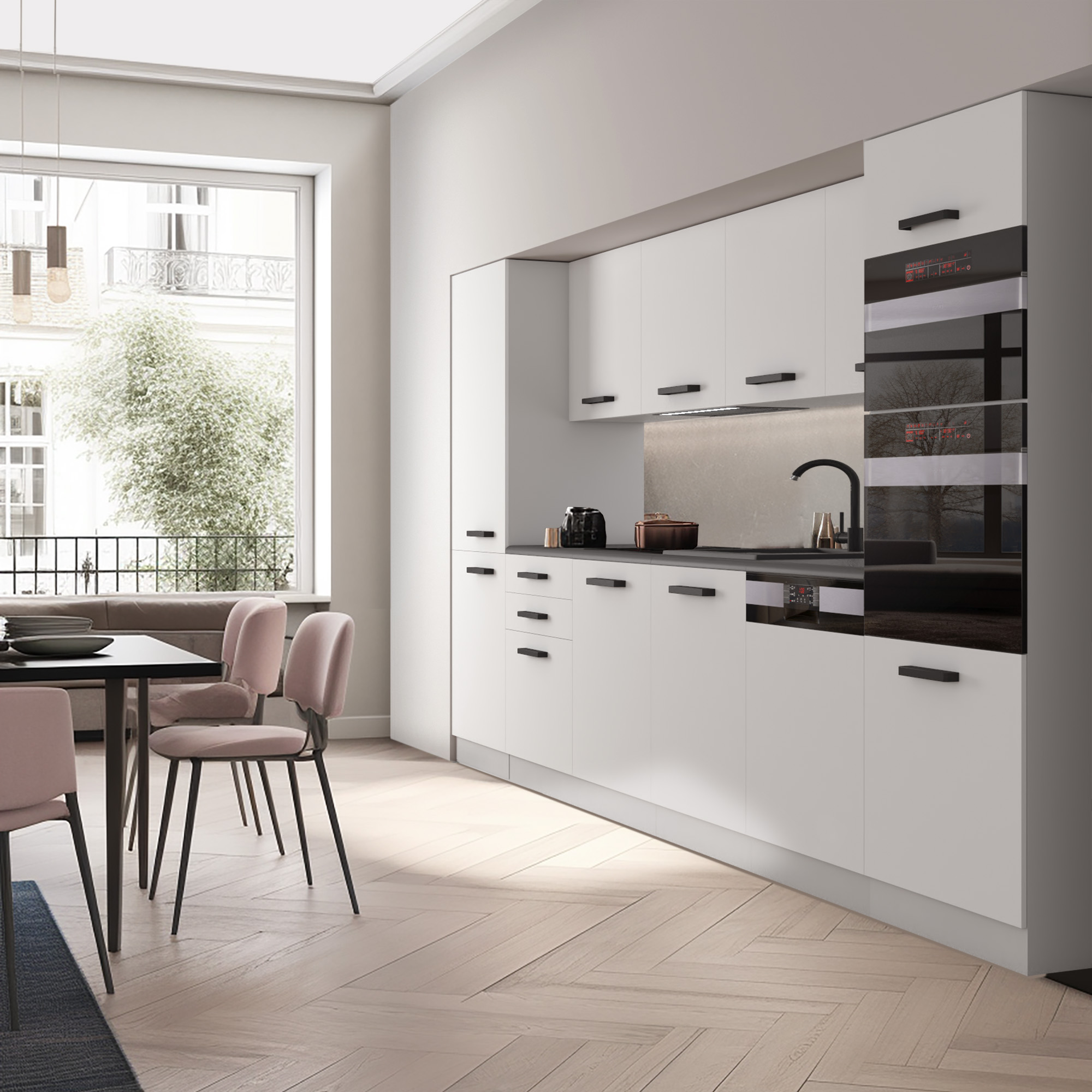 Cucina moderna con mobili bianchi e dettagli neri.